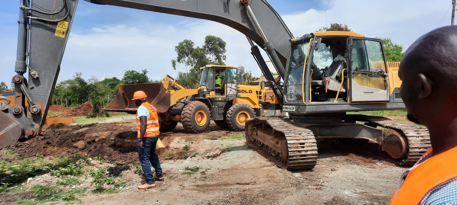 Geological team analyzing data on-site